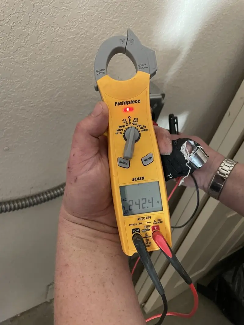 Voltage testing with clamp meter during Ceiling Fan Installation in Bithlo